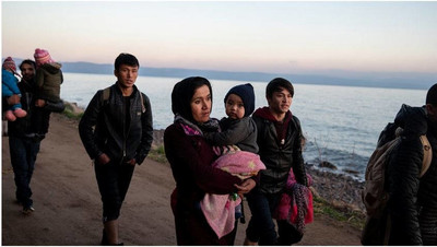 Près du village de Skala Sikamias, ces personnes viennent d'arriver sur l’île de Lesbos (archives). Crédit : Reuters