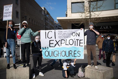 Lors d'une manifestation en soutien aux Ouïghours le 19 mars, à Nantes. (Loic Venance /AFP)
