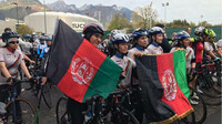 Sur la ligne de départ, elles sont cinquante cyclistes afghanes à participer à leur championnat dans la ville d'Aigle en Suisse. Crédit : RFI/Martin Guez 