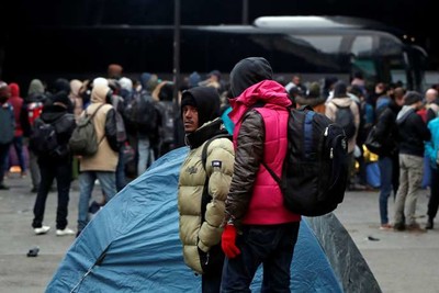Evacuation d’un camp de migrants Porte de la Chapelle, à Paris, le 29 janvier. BENOIT TESSIER / REUTERS